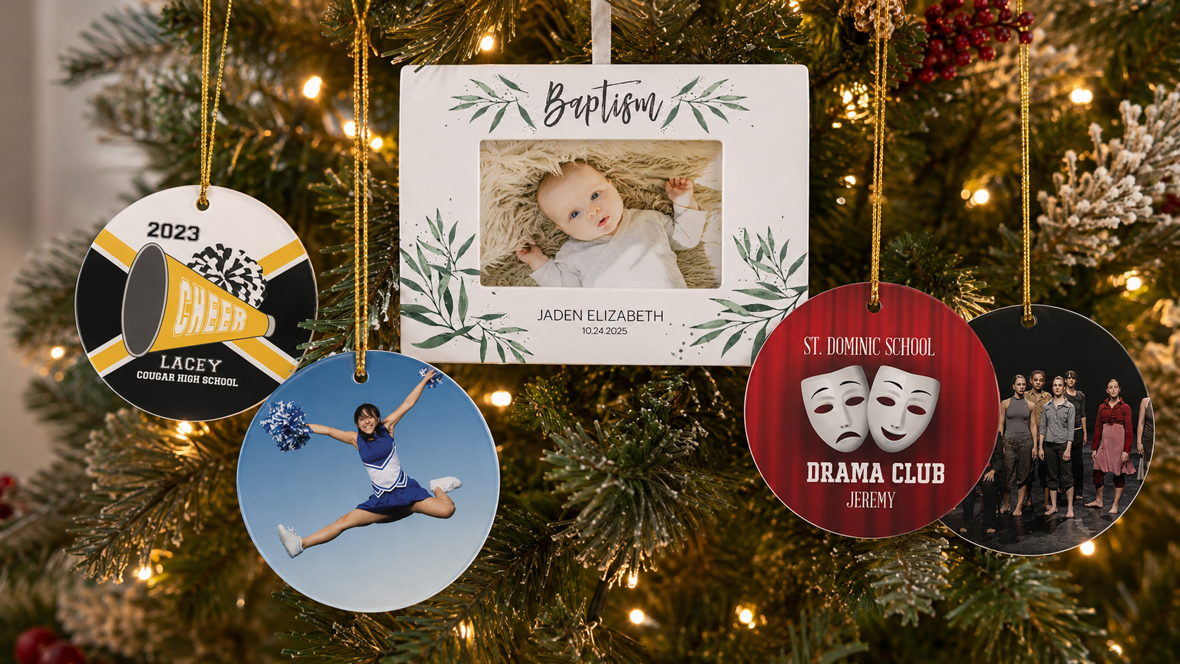 Personalized Christmas ornaments including a baptism photo ornament, cheer ornament, and drama club ornament hanging on a Christmas tree