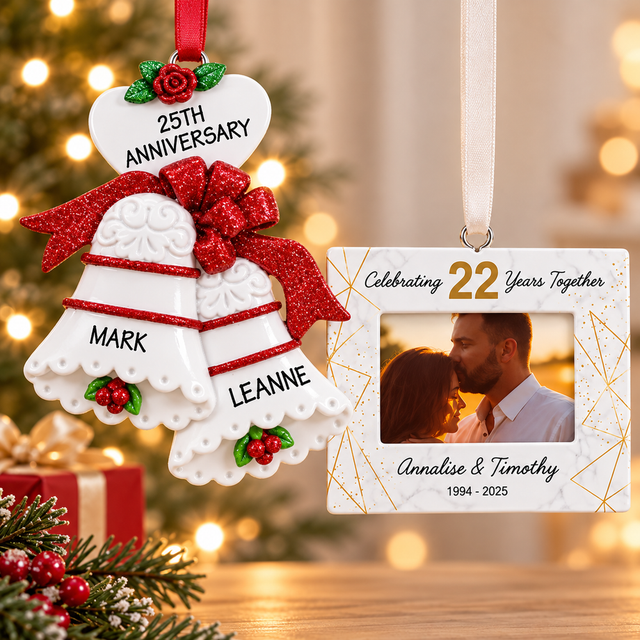 Personalized anniversary Christmas ornaments featuring 25th anniversary wedding bells for Mark and Leanne and a photo ornament celebrating 22 years together for Annalise and Timothy.