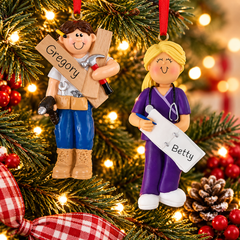 Personalized occupation Christmas ornaments featuring a handyman with tools and a nurse in purple scrubs with a stethoscope, hanging on a festive Christmas tree.