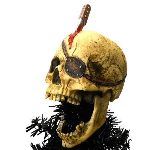 Pirate skull Christmas tree topper featuring a weathered skull with an eye patch, open jaw, knife detail, and blood-red accents.