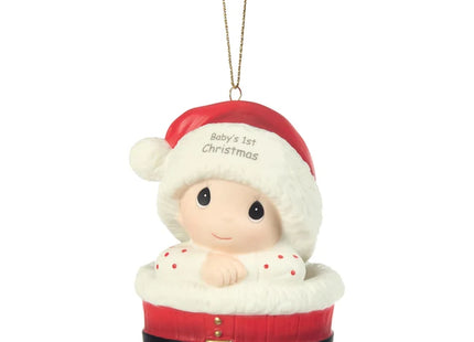 Precious Moments Baby's 1st Christmas ornament featuring a baby wearing a Santa hat and nestled inside a festive red Santa-inspired basket.