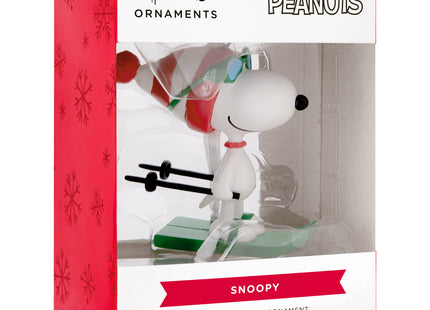Personalized Snoopy skiing Christmas ornament with skis, poles, winter hat and custom year.
