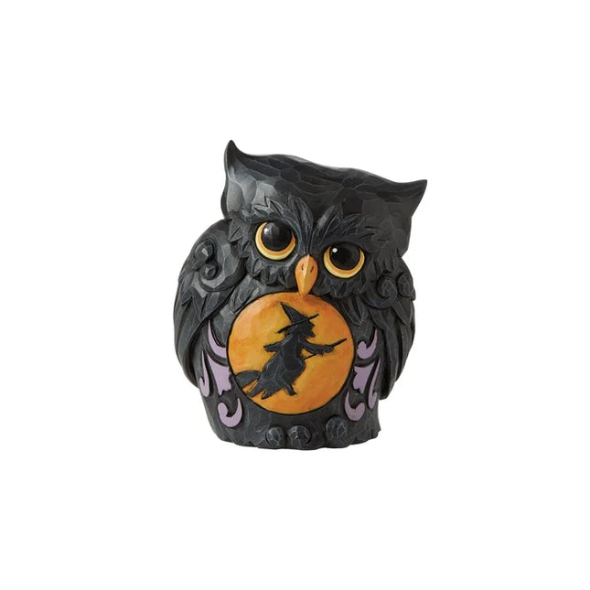 Black Halloween owl figurine with golden eyes, purple accents, and an orange moon featuring a witch flying on a broomstick.