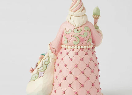 Jim Shore pink Candy Cane Santa Christmas ornament featuring pastel peppermint candies, candy cane trim, folk-art details, and a coordinating sack of sweets.