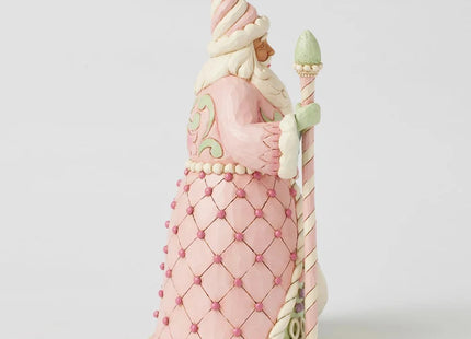 Jim Shore pink Candy Cane Santa Christmas ornament featuring pastel peppermint candies, candy cane trim, folk-art details, and a coordinating sack of sweets.
