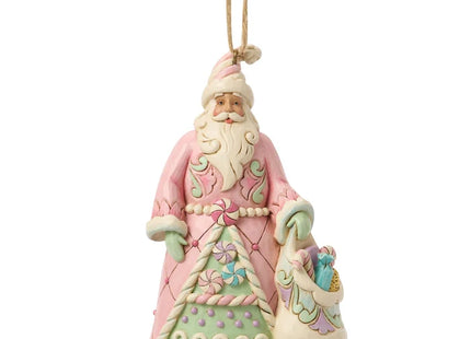 Jim Shore pink Candy Cane Santa Christmas ornament featuring pastel peppermint candies, candy cane trim, folk-art details, and a coordinating sack of sweets.
