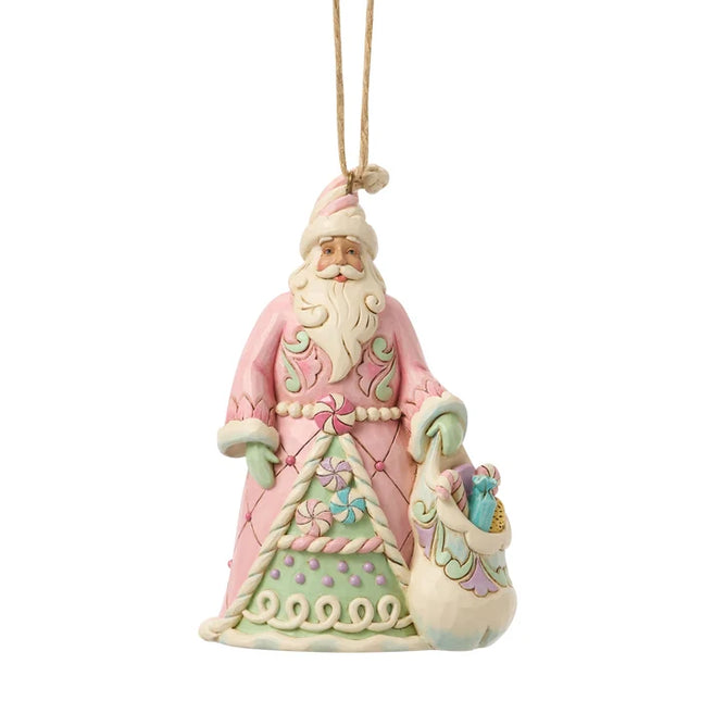 Jim Shore pink Candy Cane Santa Christmas ornament featuring pastel peppermint candies, candy cane trim, folk-art details, and a coordinating sack of sweets.