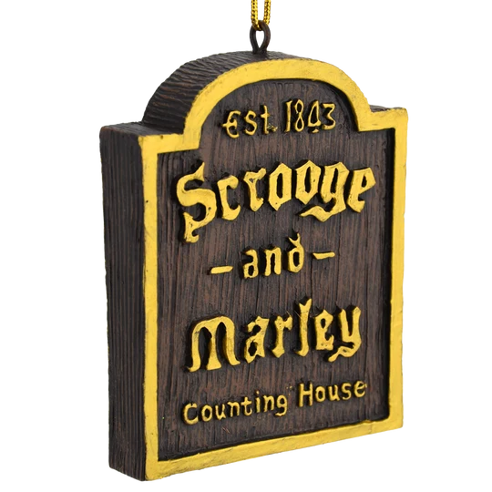 Scrooge and Marley Counting House Christmas ornament with dark wood-look finish, gold lettering, and Est. 1843 detail.