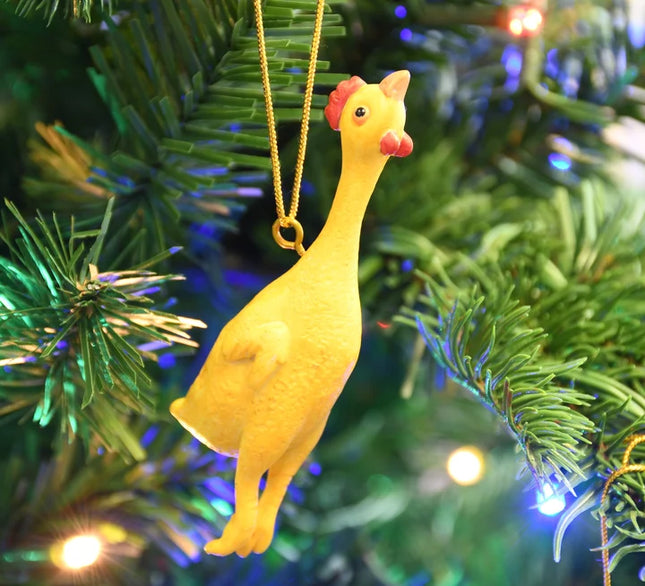 Funny yellow rubber chicken Christmas ornament with red and orange details and a gold hanging cord.