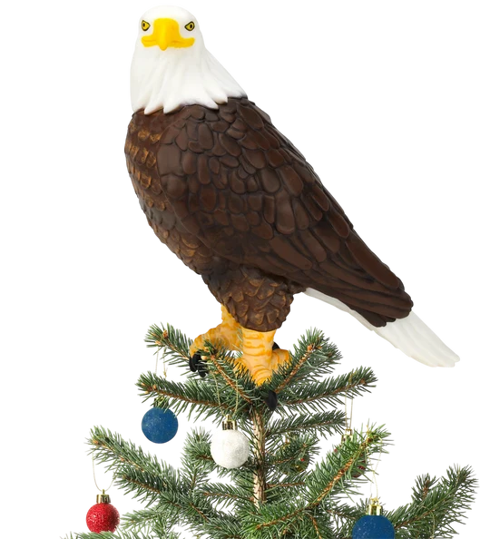 Bald eagle Christmas tree topper featuring a detailed brown body, white head and tail, yellow beak, and talons perched atop a Christmas tree.