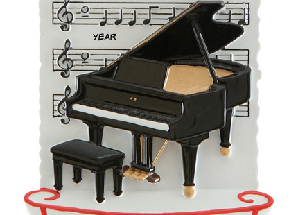 Personalized grand piano Christmas ornament with name and year featuring a black piano, bench and sheet music.