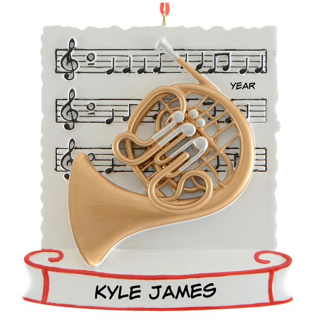 Personalized French horn Christmas ornament with name and year featuring a gold French horn and sheet music background.
