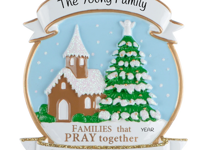 Personalized Families That Pray Together Christmas ornament with snowy church, Christmas tree, family name and year.
