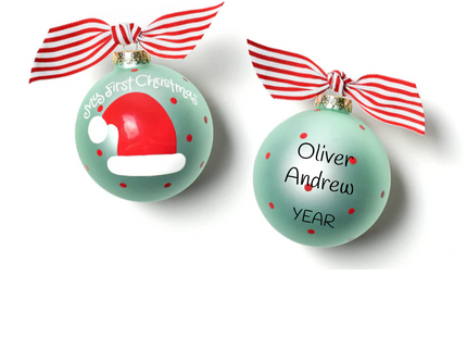Personalized My First Christmas blue glass ball ornament with Santa hat, custom name, and year