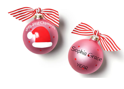 Personalized My First Christmas pink glass ball ornament with Santa hat, custom name, and year