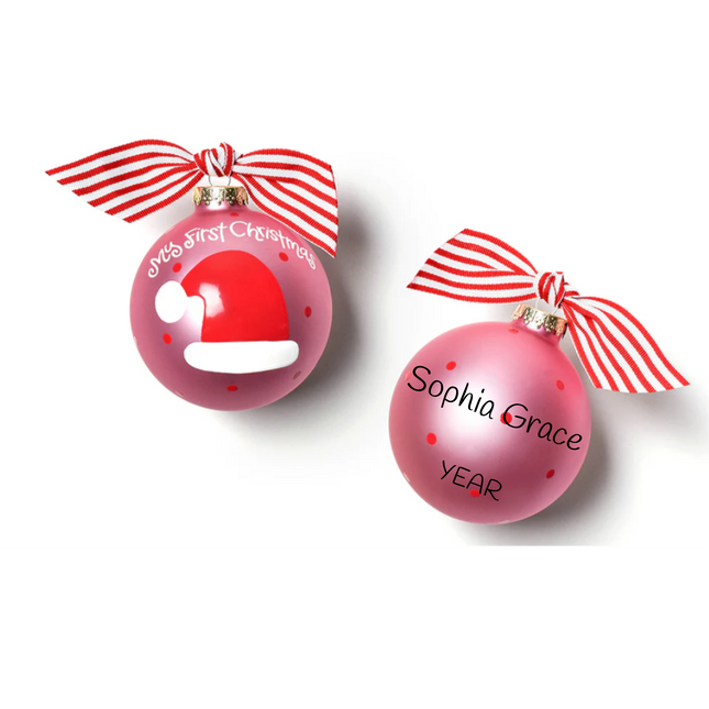 Personalized My First Christmas pink glass ball ornament with Santa hat, custom name, and year