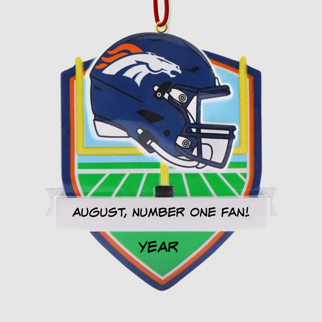 Personalized Denver Broncos football helmet Christmas ornament with custom name and optional year on a football field background.