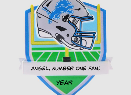 Personalized Detroit Lions football helmet Christmas ornament with custom name and optional year on a football field background.