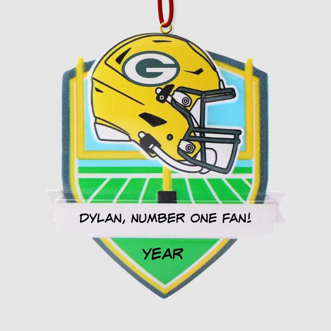 Personalized Green Bay Packers football helmet Christmas ornament with custom name and optional year on a football field background.