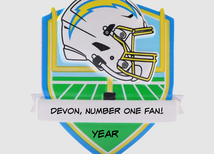 Personalized Los Angeles Chargers football helmet Christmas ornament with custom name and optional year on a football field background.