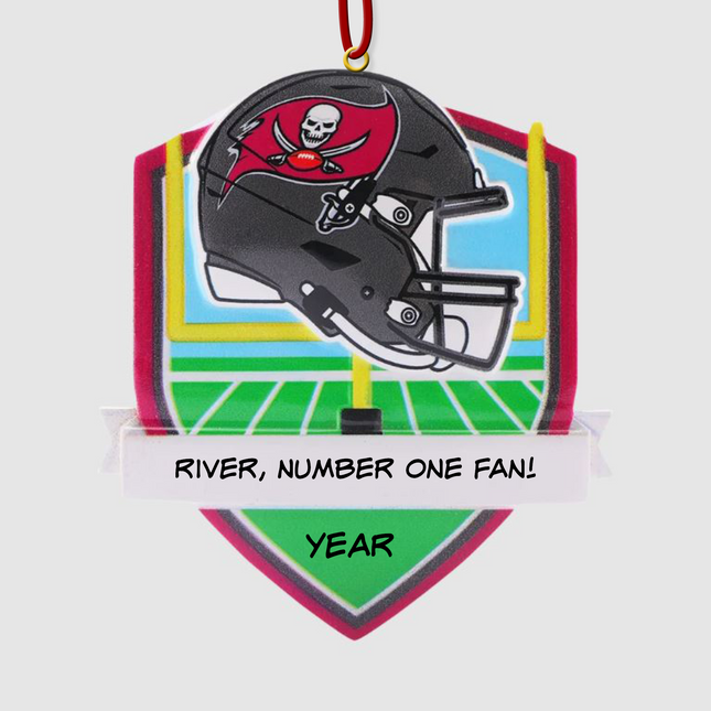 Personalized Tampa Bay Buccaneers helmet Christmas ornament featuring a football field background and custom name banner.