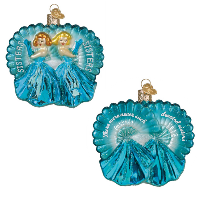 Personalized sisters blue glass Christmas ornament featuring two sisters with custom names on the back.