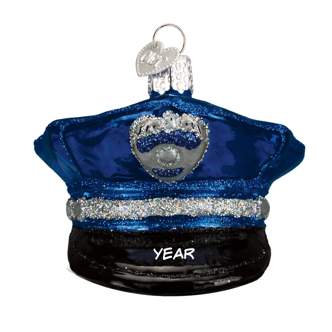 Personalized blue police officer hat glass Christmas ornament with silver badge and custom year.