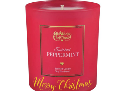 Personalized Twisted Peppermint scented soy candle in a red frosted glass jar with a custom holiday message on the front.