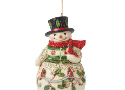 Jim Shore woodland snowman Christmas ornament with cardinal bird, holly leaves, and folk art detailing
