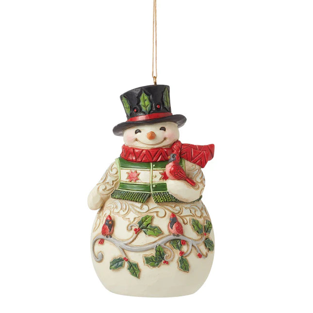 Jim Shore woodland snowman Christmas ornament with cardinal bird, holly leaves, and folk art detailing