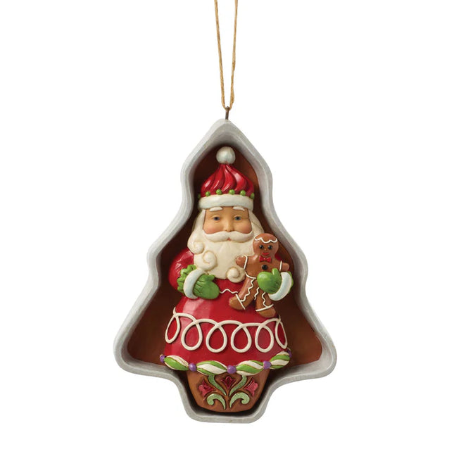 Jim Shore Santa in Christmas tree cookie cutter ornament holding a gingerbread cookie
