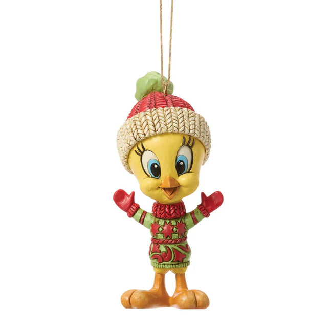 Jim Shore Tweety Bird Christmas ornament wearing a knit winter hat, sweater, and red mittens