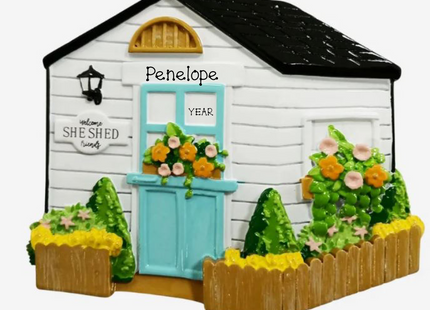 Personalized She Shed Christmas ornament with custom name and year featuring a charming garden shed