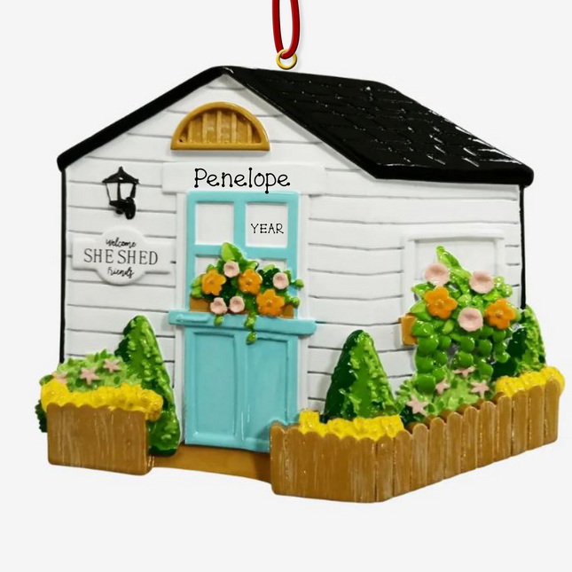 Personalized She Shed Christmas ornament with custom name and year featuring a charming garden shed
