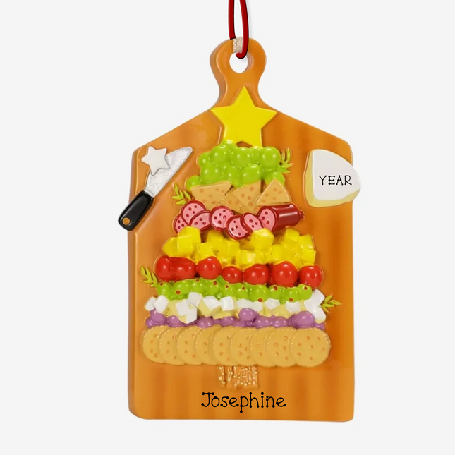 Personalized charcuterie board Christmas ornament with custom name and year featuring cheese, crackers, fruit, and meats