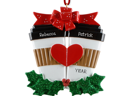 Personalized coffee couple Christmas ornament with two custom names and year featuring festive coffee cups joined by a heart.