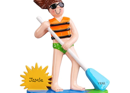 Personalized female paddleboarding ornament with ponytail, orange life vest, blue board, Jamie on sun and year on paddle