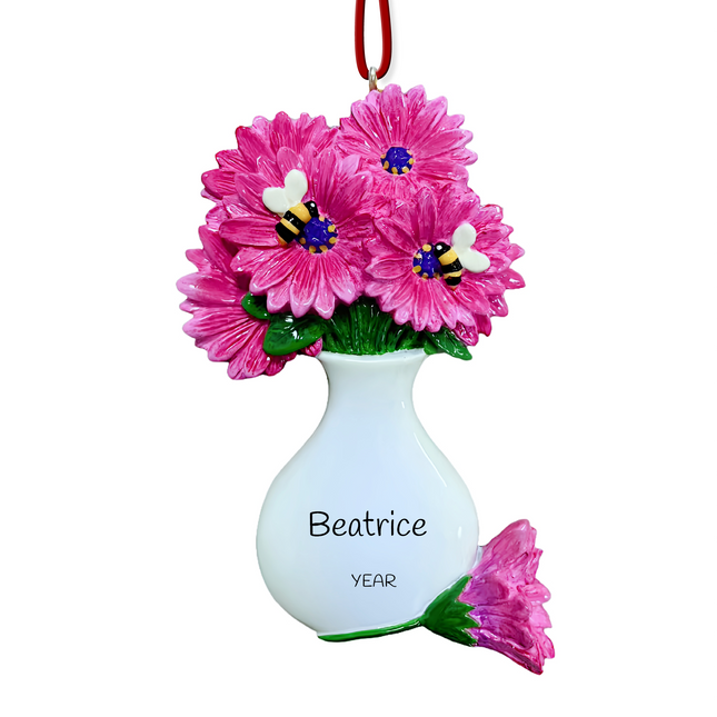 Personalized pink daisy bouquet Christmas ornament with custom name and year featuring vibrant pink daisies in a white vase with decorative bees.