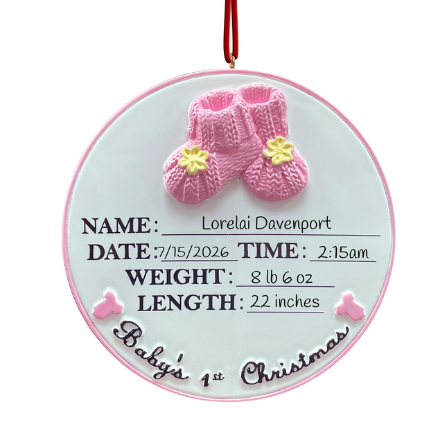 Personalized Baby's First Christmas ornament with pink baby booties featuring custom name, birth date, birth time, birth weight, birth length, and year.