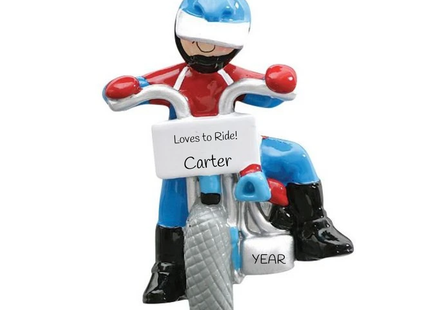 Personalized dirt bike rider Christmas ornament featuring a motocross rider in a blue helmet and red jersey on a dirt bike with custom name, message, and year.