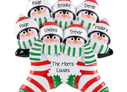 Personalized eight penguin Christmas ornament with The Morris Cousins on snowflake and eight names on hats