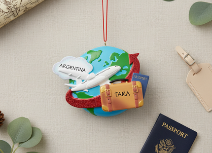 Travel Ornament premium flatlay with vintage map and passport props